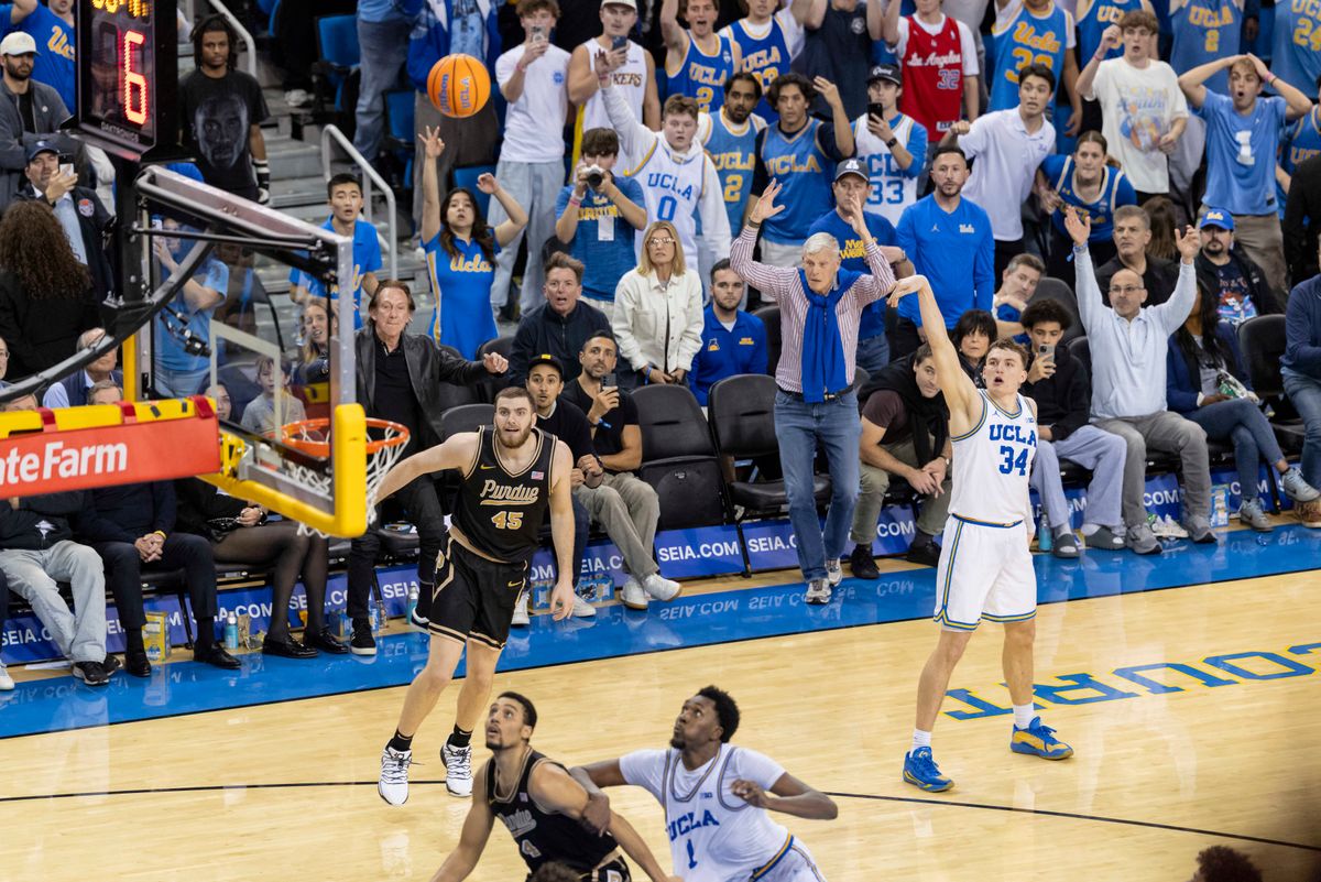 Tyler Bilodeau #34 of the UCLA Bruins makes the game-winning three point shot during an NCAA basketball game against the Purdue Boilermakers, Tuesday January 20, 2026 in Los Angeles, Calif.