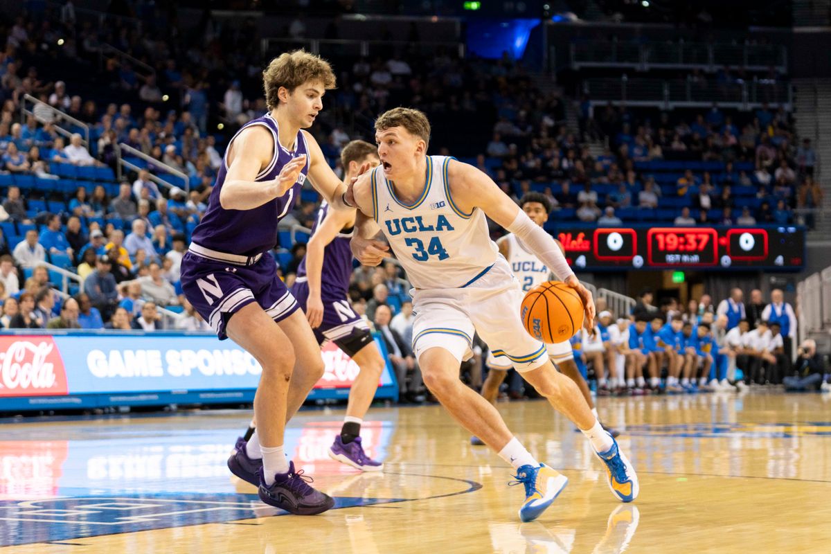 UCLA forward Tyler Bilodeau (34) takes it strong to the basket during an NCAA basketball game against Northwestern, Saturday January 24th, 2026 in Los Angeles, California. 