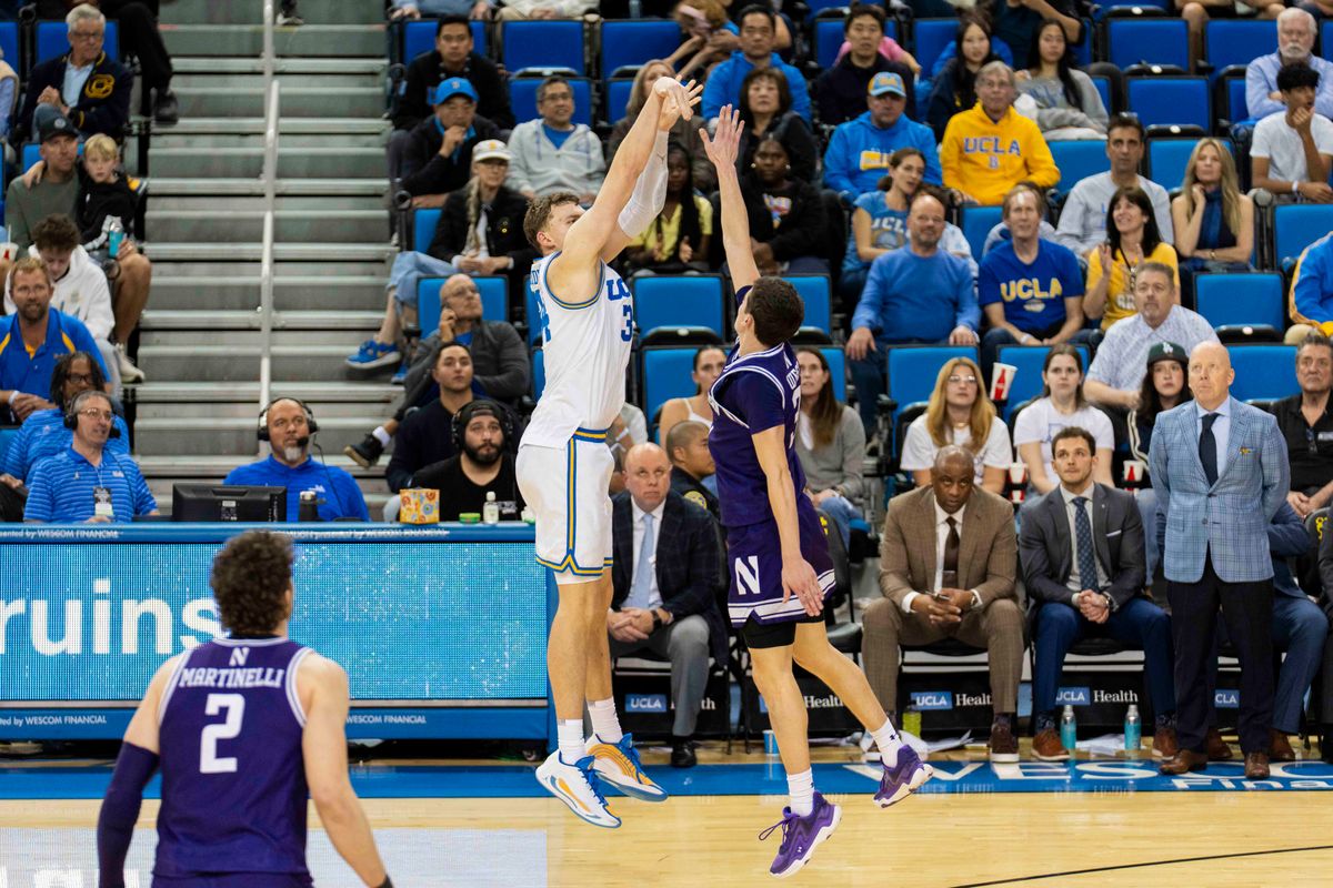 UCLA forward Tyler Bilodeau (34) shoots a three during an NCAA basketball game against Northwestern, Saturday January 24th, 2026 in Los Angeles, California. 