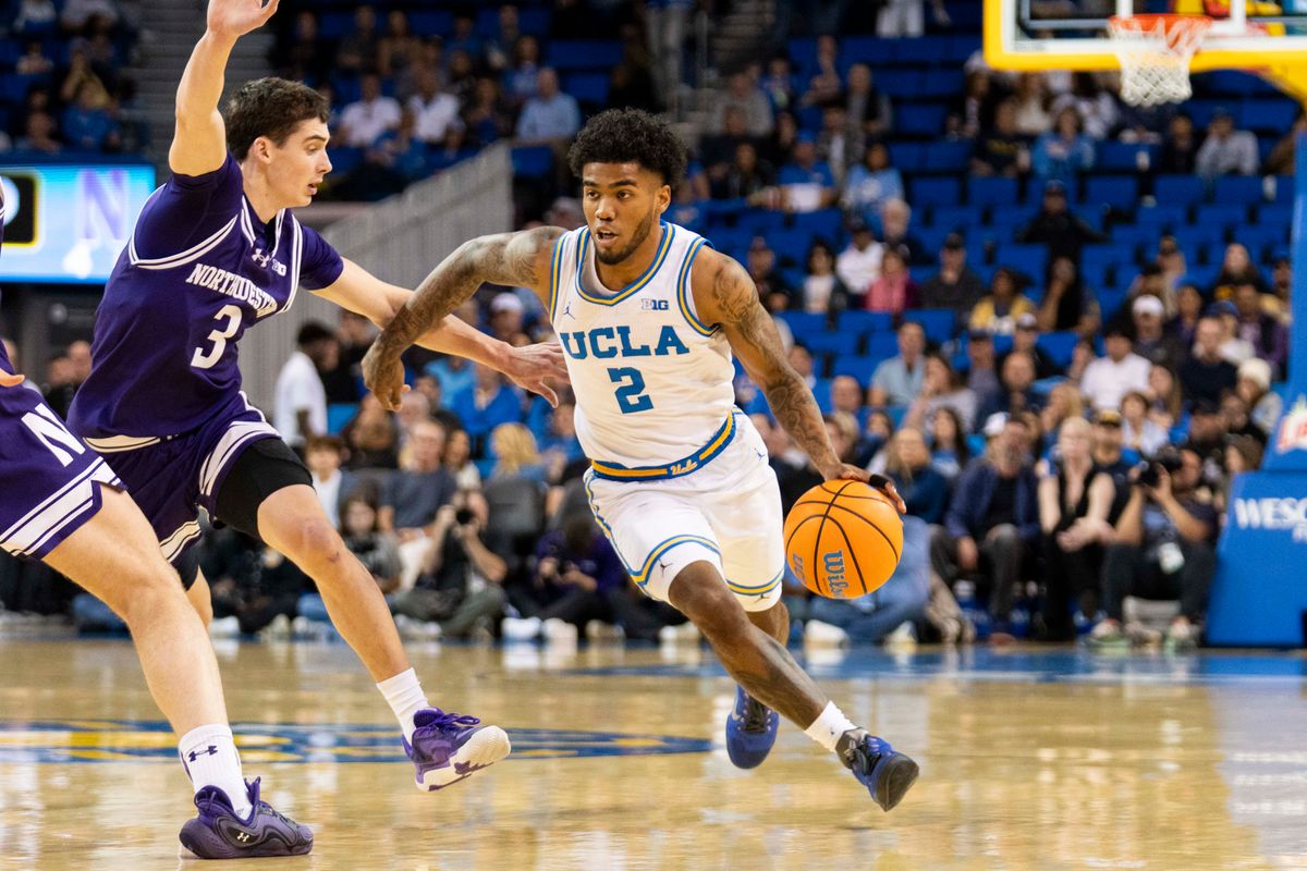 UCLA guard Donovan Dent (2) drives to the basket during an NCAA basketball game against Northwestern, Saturday January 24th, 2026 in Los Angeles, California. 