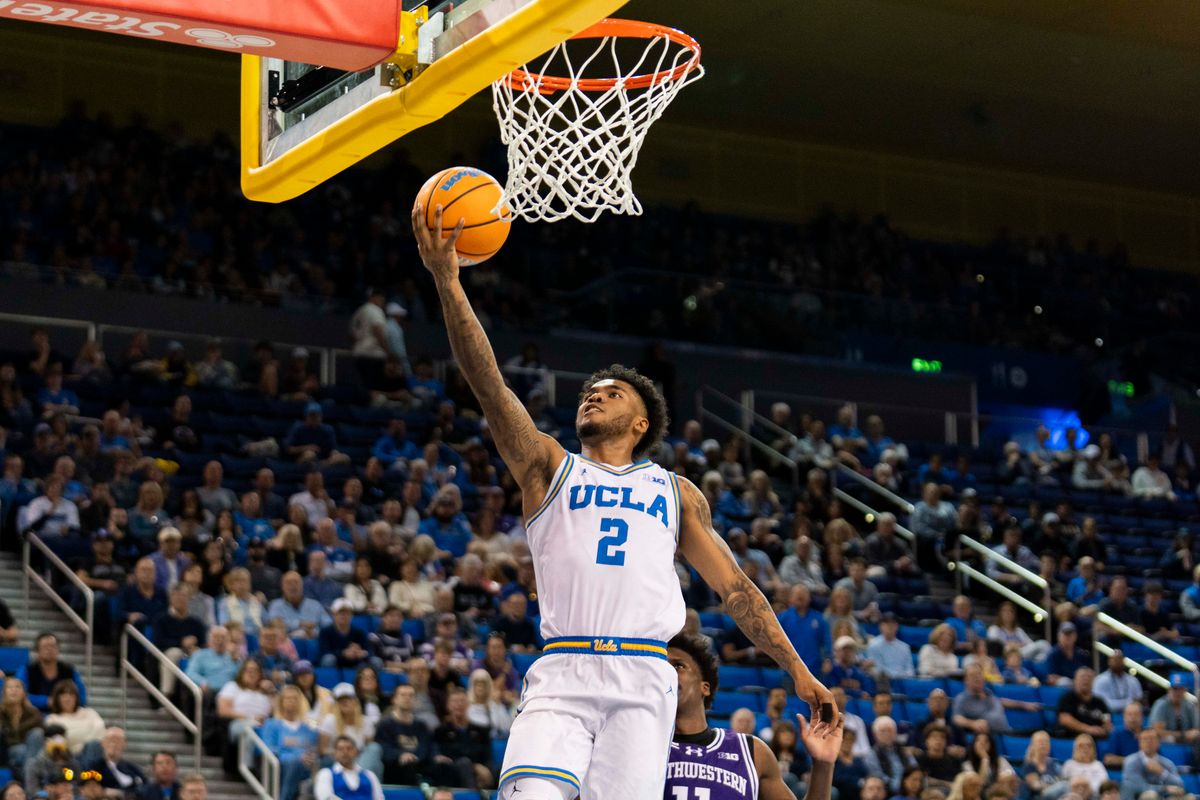 UCLA guard Donovan Dent (2) scores the fast break lay up during an NCAA basketball game against Northwestern, Saturday January 24th, 2026 in Los Angeles, California. 