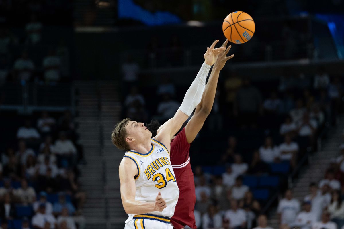 UCLA forward Tyler Bilodeau (34) tips off for overtime during a Big 10 basketball game against Indiana, Saturday, January 31st, 2026 in Los Angeles, California