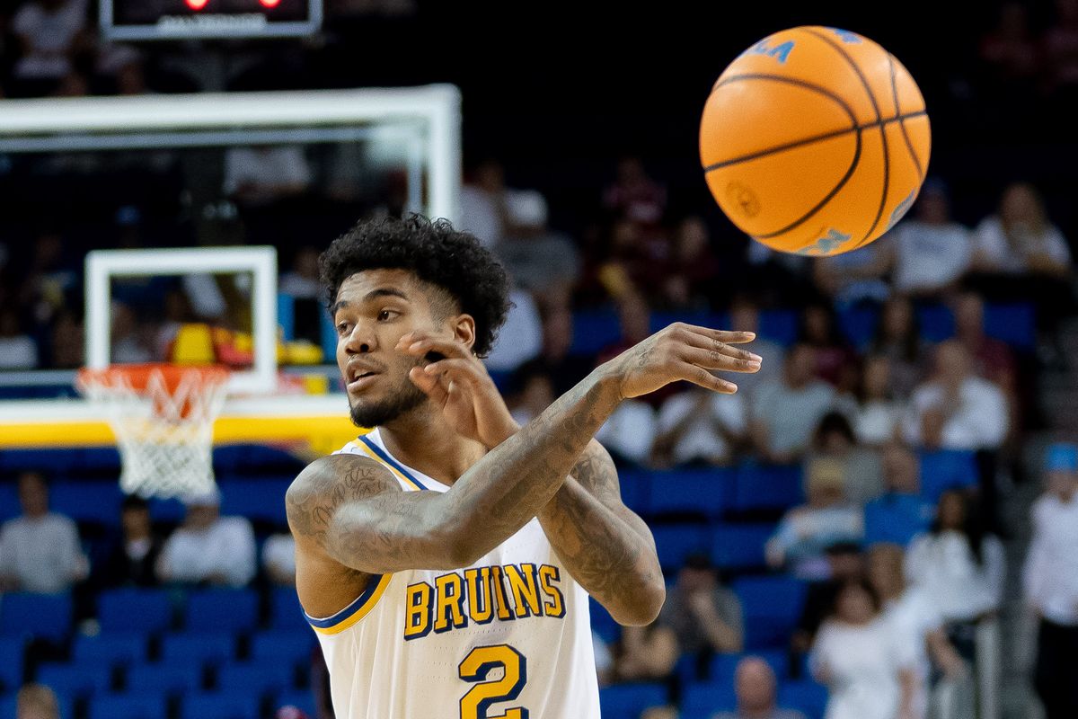 UCLA guard Donovan Dent (2) makes a no-look pass during a Big 10 basketball game against Indiana, Saturday, January 31st, 2026 in Los Angeles, California