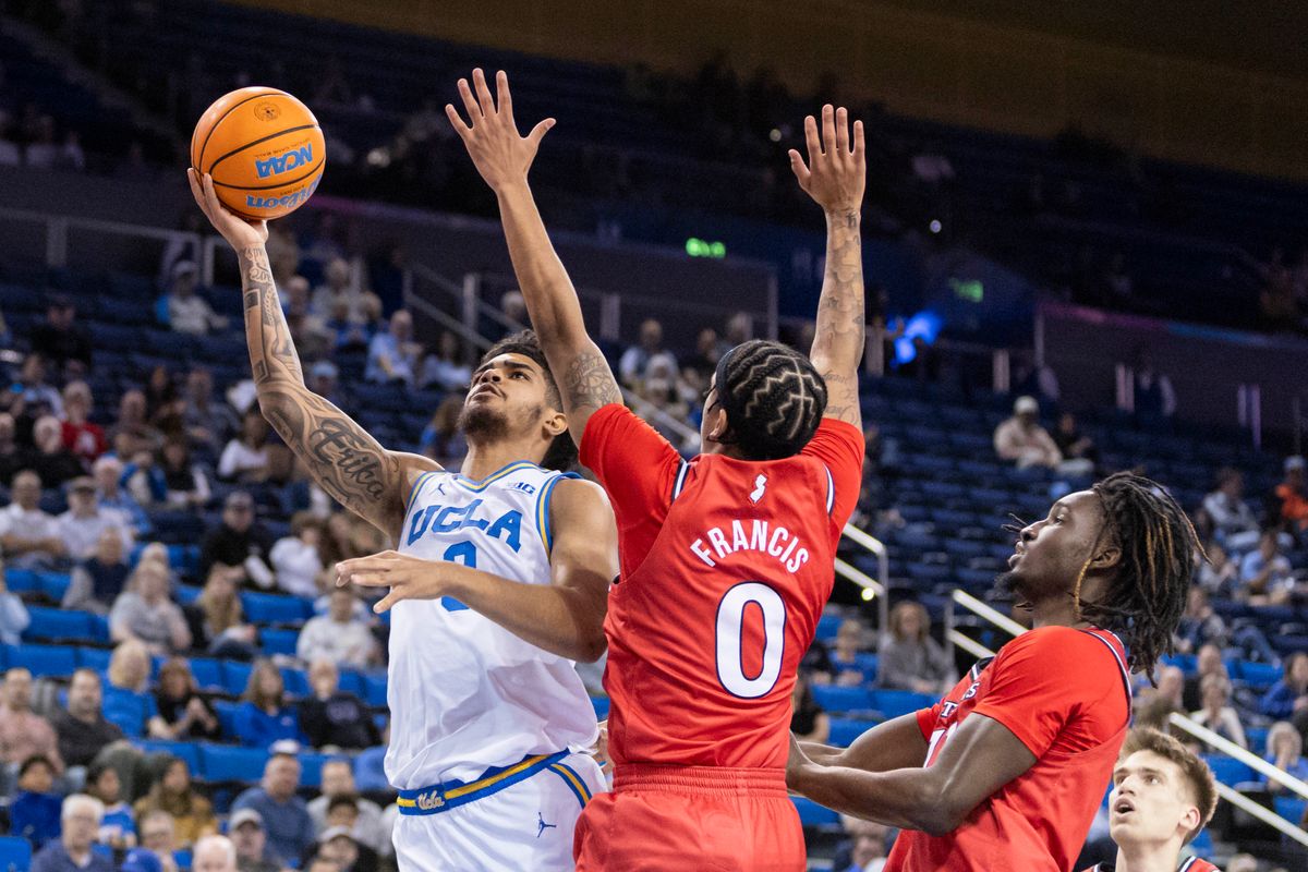 Eric Freeny #8 of the UCLA Bruins shoots the ball during an NCAA basketball game against the Rutgers Scarlet Knights, Tuesday February 3, 2026 in Los Angeles, Calif.