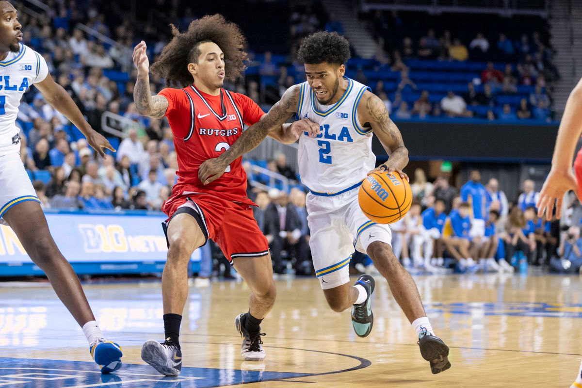 Donovan Dent #2 of the UCLA Bruins drives towards the basket during an NCAA basketball game against the Rutgers Scarlet Knights, Tuesday February 3, 2026 in Los Angeles, Calif.