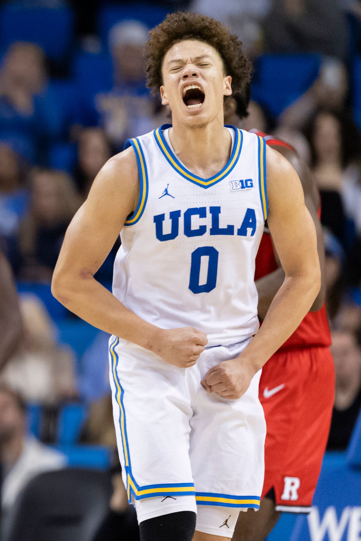 Trent Perry #0 of the UCLA Bruins celebrates during an NCAA basketball game against the Rutgers Scarlet Knights, Tuesday February 3, 2026 in Los Angeles, Calif.