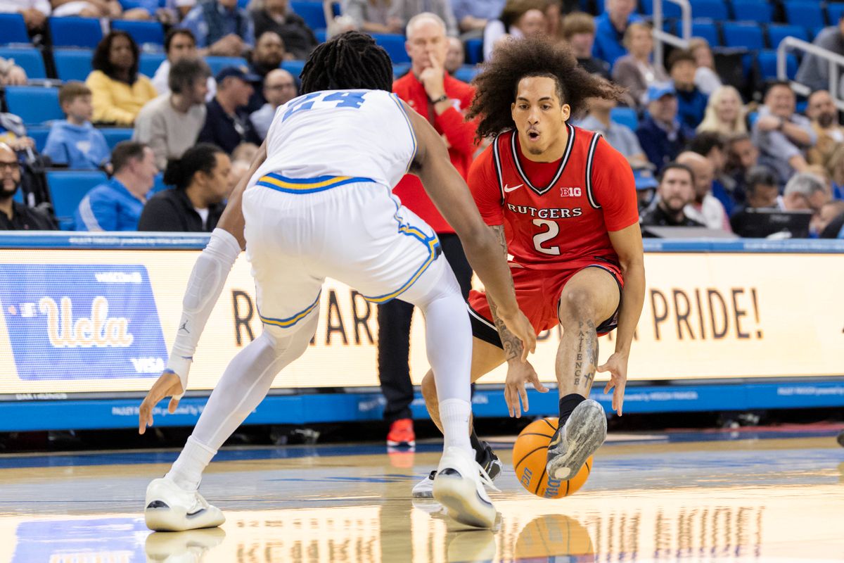 Lino Mark #2 of the Rutgers Scarlet Knights handles the ball during an NCAA basketball game against the UCLA Bruins, Tuesday February 3, 2026 in Los Angeles, Calif.