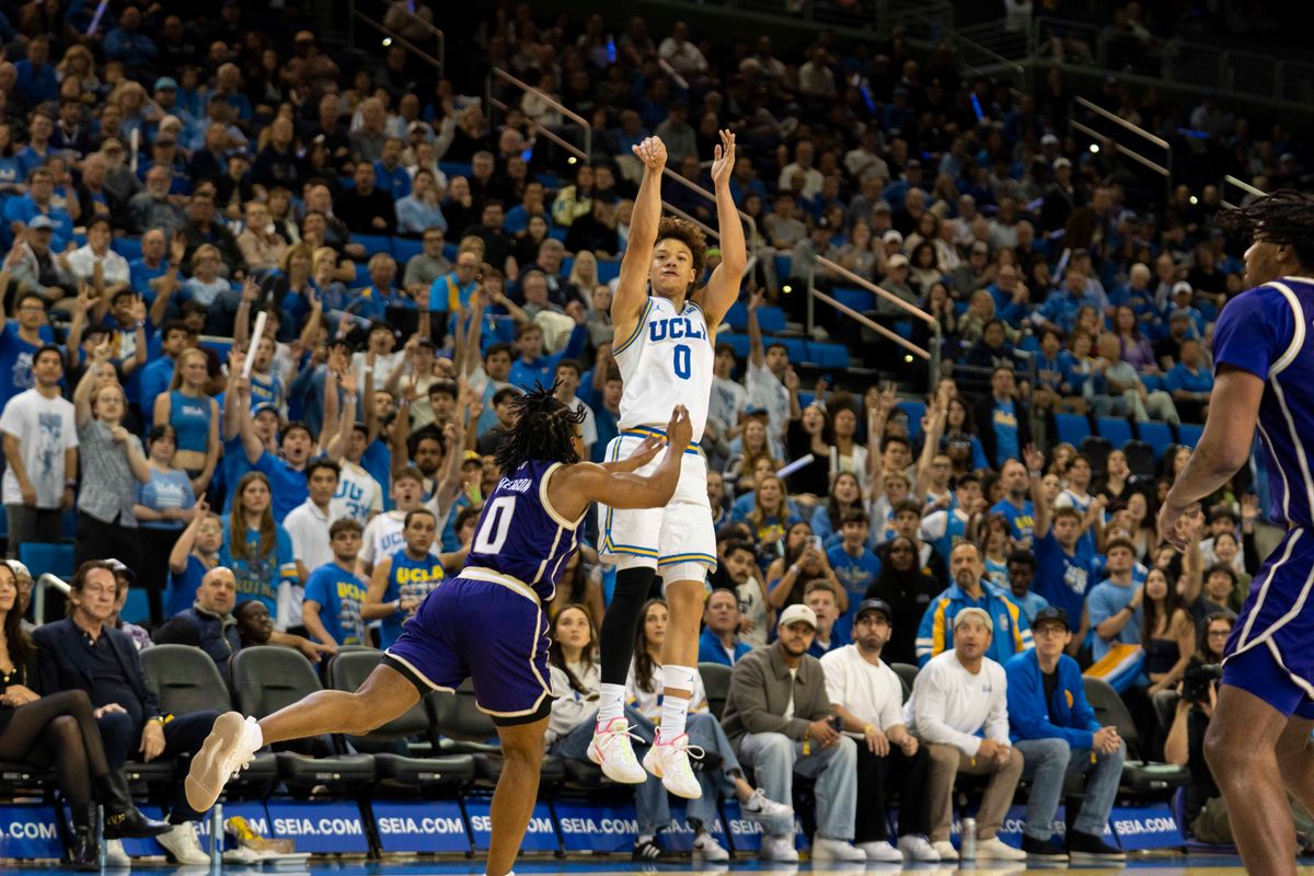 UCLA guard Trent Perry (0) hits the three during an NCAA basketball game against Washington, Saturday February 7th, 2026 in Los Angeles, California. 