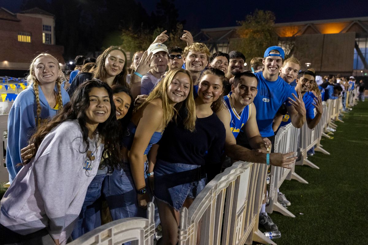 UCLA students line up outside Pauley Pavilion for a chance to get a seat in the Den student section before an NCAA basketball game against the USC Trojans, Tuesday February 24, 2026 in Los Angeles, Calif.