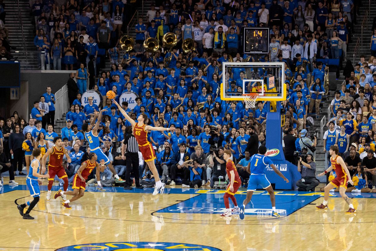 Donovan Dent #2 of the UCLA Bruins hits a shot at the halftime buzzer during an NCAA basketball game against the USC Trojans, Tuesday February 24, 2026 in Los Angeles, Calif.