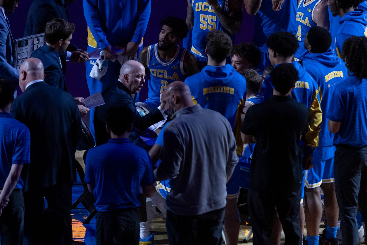 Head coach Mick Cronin of the UCLA Bruins talks in the huddle during an NCAA basketball game against the USC Trojans, Tuesday February 24, 2026 in Los Angeles, Calif.