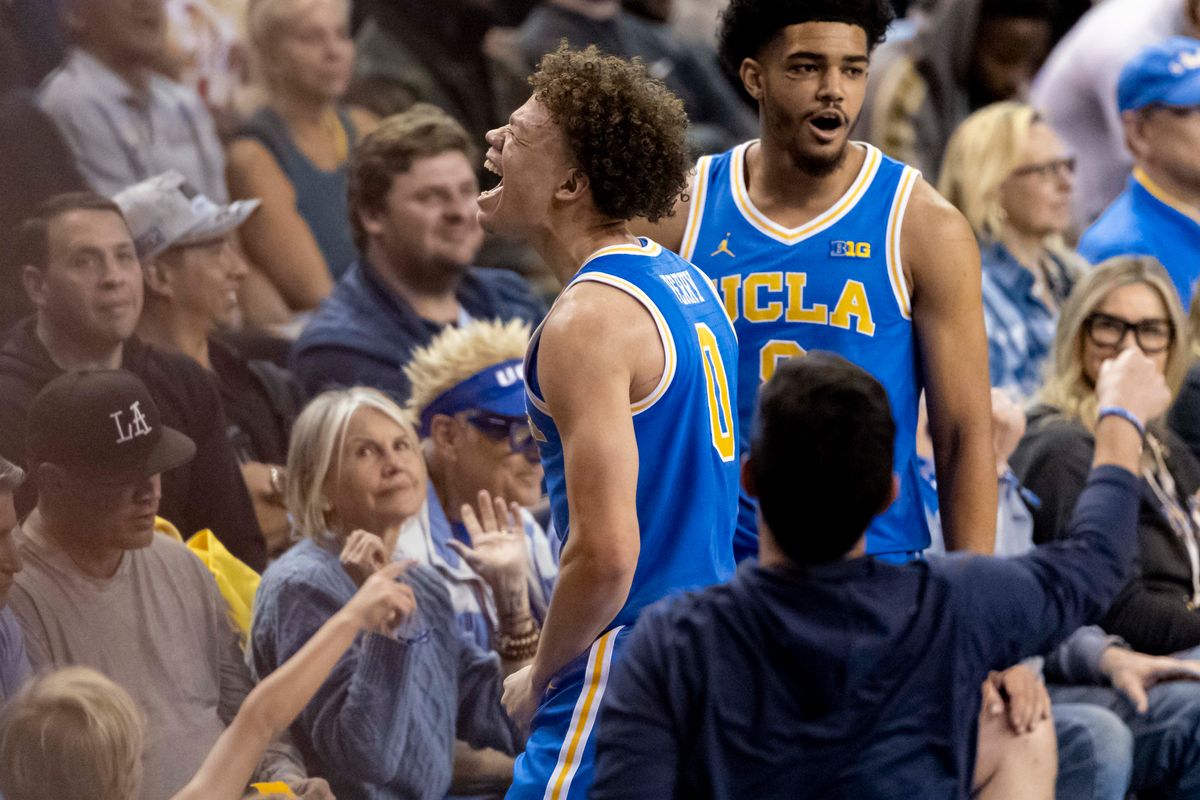 Trent Perry #0 of the UCLA Bruins celebrates during an NCAA basketball game against the USC Trojans, Tuesday February 24, 2026 in Los Angeles, Calif.