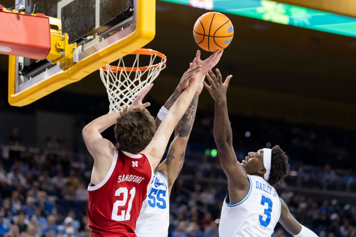 Pryce Sandfort #21 of the Nebraska Cornhuskers lays the ball up against Eric Dailey Jr. #3 of the UCLA Bruins during an NCAA basketball game, Tuesday March 3, 2026 in Los Angeles, Calif.