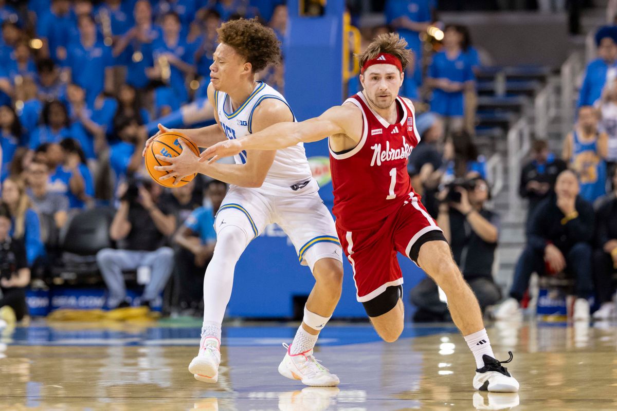 Sam Hoiberg #1 of the Nebraska Cornhuskers tries to steal the ball from Trent Perry #0 of the UCLA Bruins during an NCAA basketball game, Tuesday March 3, 2026 in Los Angeles, Calif.