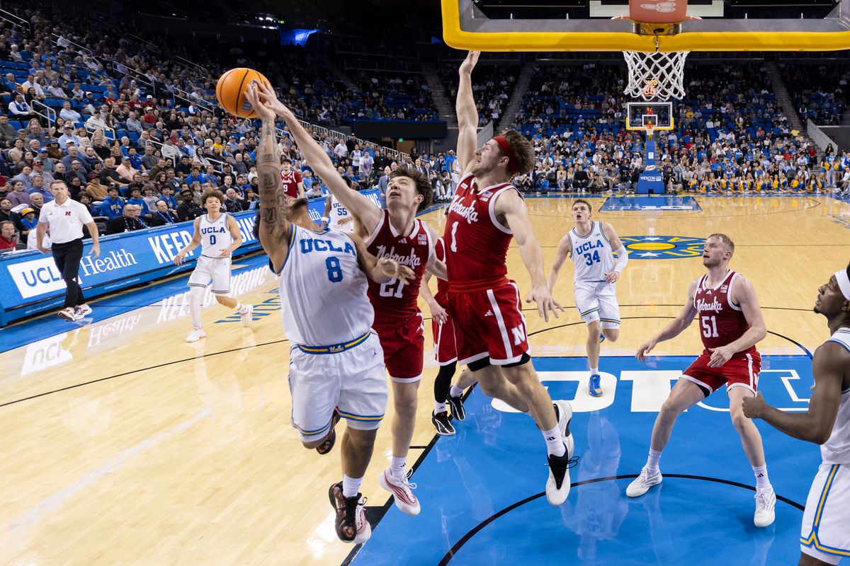 Pryce Sandfort #21 of the Nebraska Cornhuskers blocks the shot by Eric Freeny #8 of the UCLA Bruins during an NCAA basketball game, Tuesday March 3, 2026 in Los Angeles, Calif.