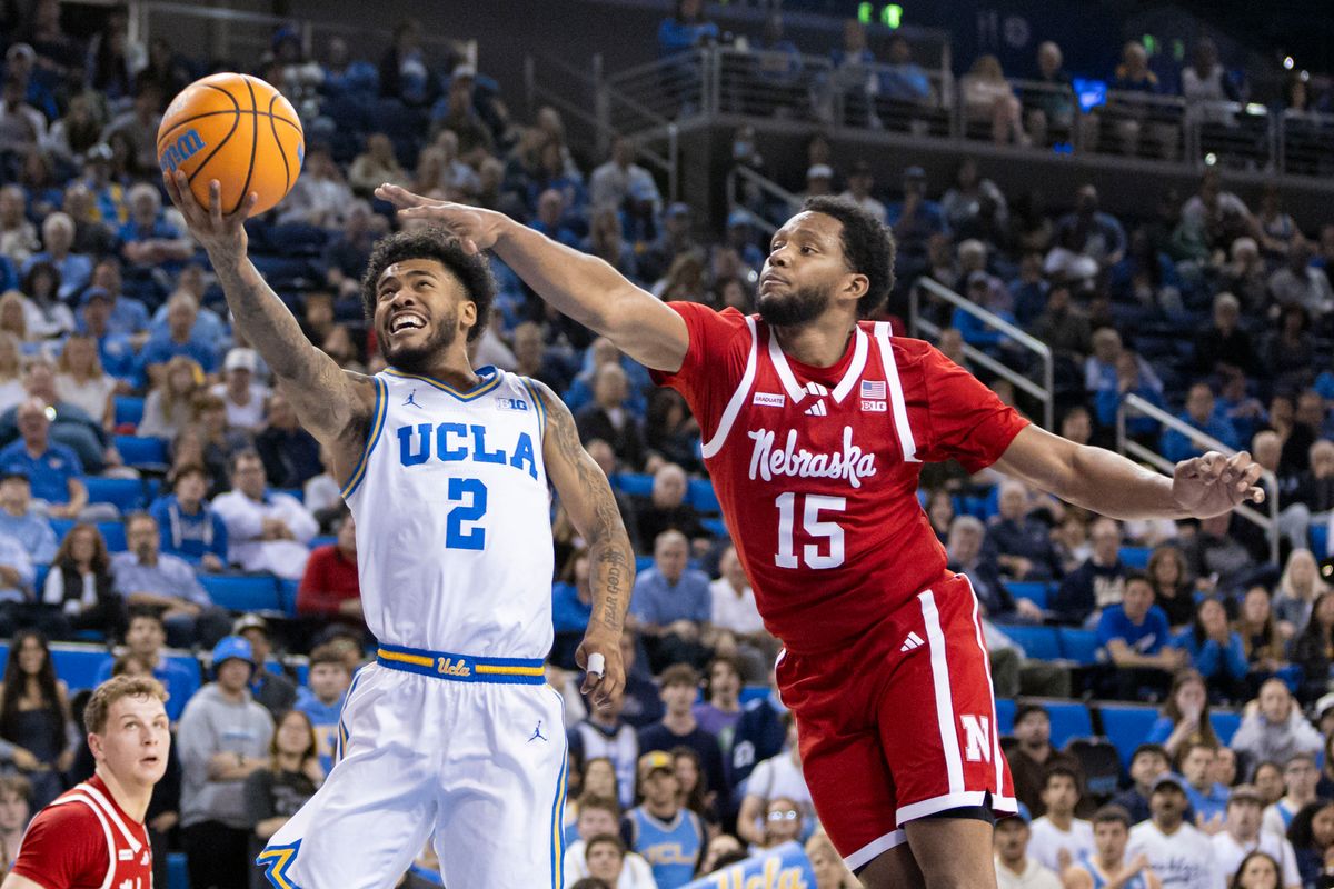 Donovan Dent #2 of the UCLA Bruins lays the ball up as Jared Garcia #15 of the Nebraska Cornhuskers reaches for the block during an NCAA basketball game, Tuesday March 3, 2026 in Los Angeles, Calif.