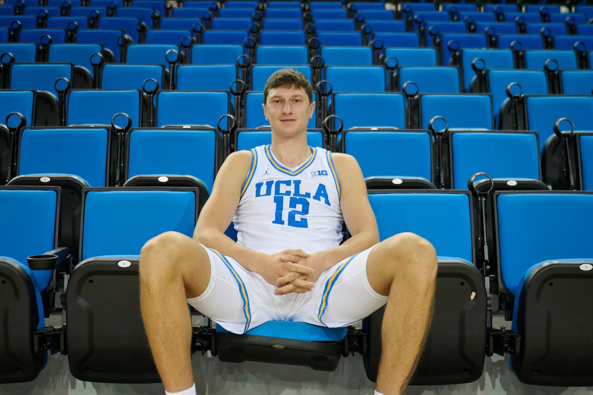 The UCLA men's basketball forward Sergej Macura (12) poses during media day at Pauley Pavilion in Los Angeles, Tuesday, Oct. 6, 2026. The UCLA men's basketball forward Sergej Macura (12) poses during media day at Pauley Pavilion in Los Angeles, Tuesday, Oct. 6, 2026.
