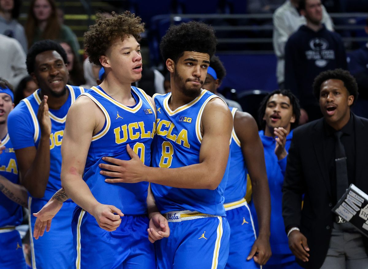 UCLA Bruins guard Trent Perry (0) is congratulated by guard Eric Freeny (8) after scoring a basket during the second half against the Penn State Nittany Lions at Bryce Jordan Center.