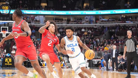 Donovan Dent makes history while leading UCLA past Rutgers taken at United Center (UCLA). Photo by David Banks-Imagn Images