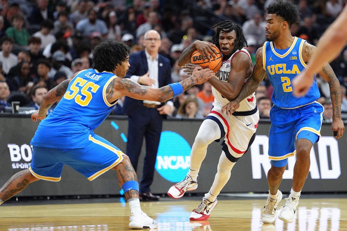 UConn Huskies guard Malachi Smith (0) dribbles the ball against the UCLA Bruins in the second half during a second round game of the men's 2026 NCAA Tournament at Xfinity Mobile Arena. 