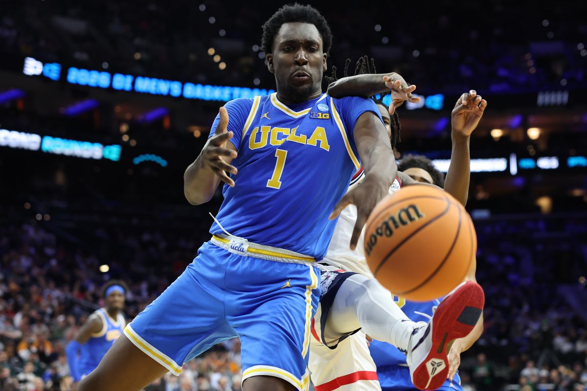 UCLA Bruins center Xavier Booker (1) attempts to get a rebound against the UConn Huskies in the second half during a second round game of the men's 2026 NCAA Tournament at Xfinity Mobile Arena. 