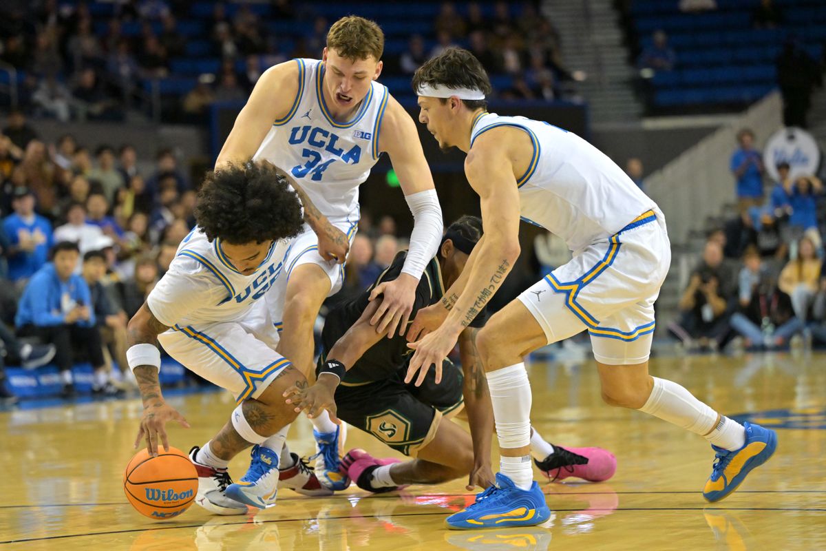Sacramento State Hornets guard Prophet Johnson (16), UCLA Bruins guard Skyy Clark (55), forward Tyler Bilodeau (34) and guard Jamar Brown (4) scramble for a loose ball during the first half at Pauley Pavilion presented by Wescom Financial. Sacramento State Hornets guard Prophet Johnson (16), UCLA Bruins guard Skyy Clark (55), forward Tyler Bilodeau (34) and guard Jamar Brown (4) scramble for a loose ball during the first half at Pauley Pavilion presented by Wescom Financial.