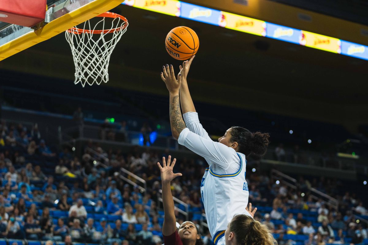UCLA Bruins Forward Timea Gardiner (30) shooting a turn around jumper during an NCAA basketball game against Colgate, Sunday November 10th, 2024 in Los Angeles, California. 