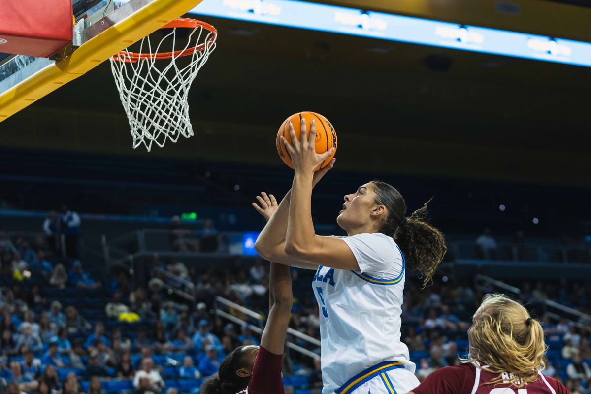 UCLA Bruins Center Lauren Betts (51)  laying-up the ball during an NCAA basketball game against Colgate, Sunday November 10th, 2024 in Los Angeles, California. 