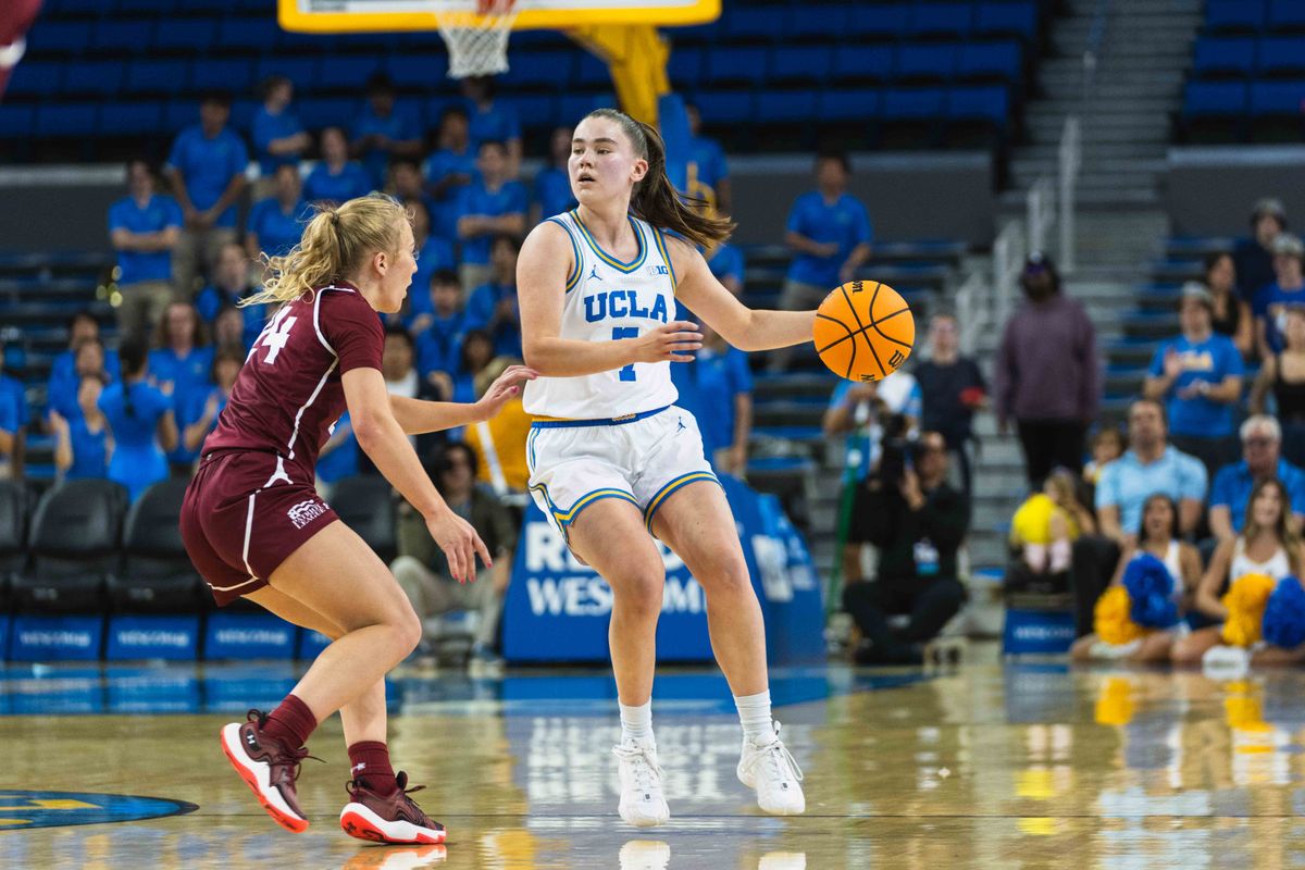 UCLA Bruins Guard Elina Aarnisalo (7) coordinating the offense during an NCAA basketball game against Colgate, Sunday November 10th, 2024 in Los Angeles, California. 