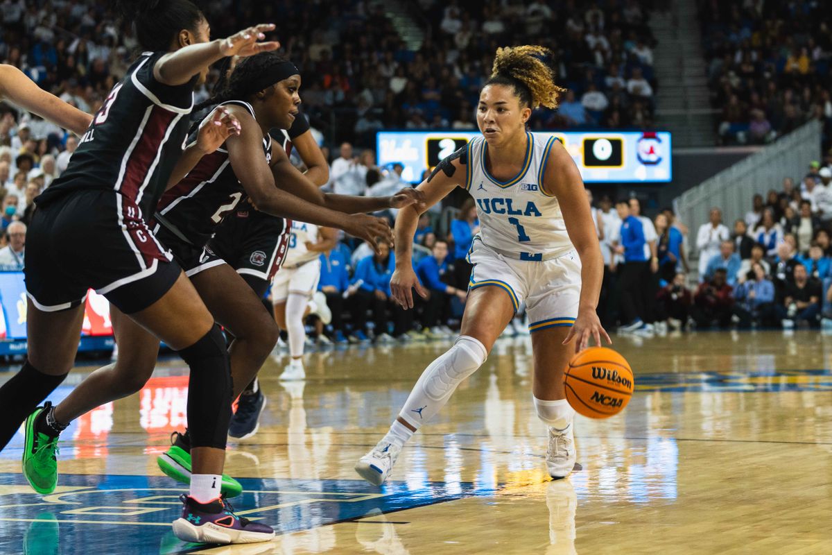 UCLA guard Kiki Rice (1) driving into the lane during an NCAA basketball game against the South Carolina Gamecocks, Sunday November 24th, 2024 in Los Angeles, California.