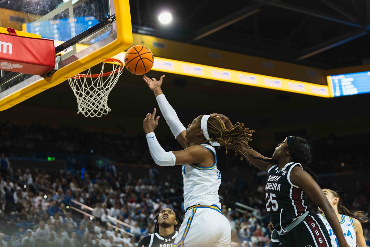 UCLA forward Janiah Barker (0) scoring tough lay-up during an NCAA basketball game against the South Carolina Gamecocks, Sunday November 24th, 2024 in Los Angeles, California. UCLA forward Janiah Barker (0) scoring tough lay-up during an NCAA basketball game against the South Carolina Gamecocks, Sunday November 24th, 2024 in Los Angeles, California.