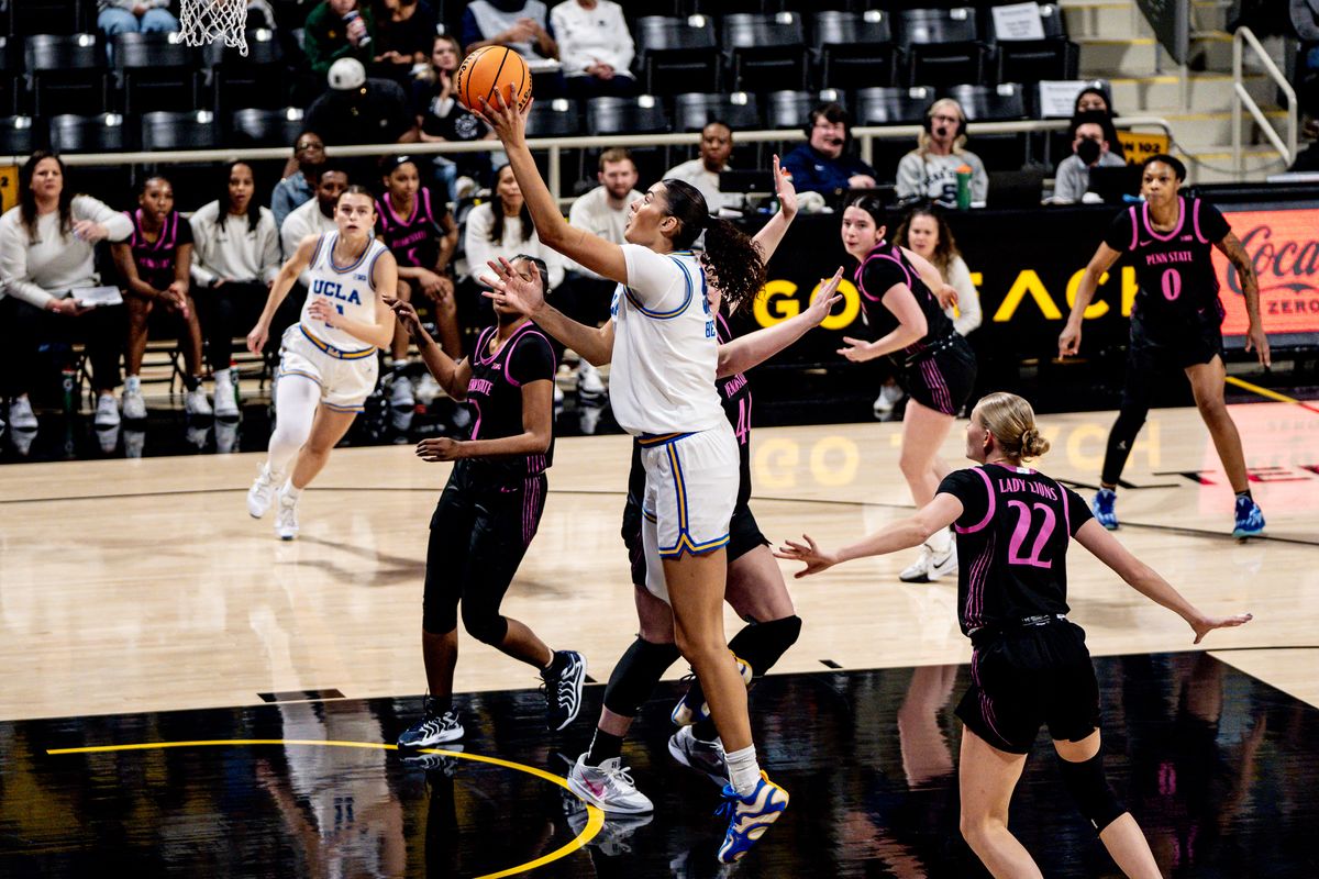 USC C Lauren Betts (51) attacks the rim for two points in a game against Penn State, Wednesday January 15, 2025 in Long Beach, Calif.