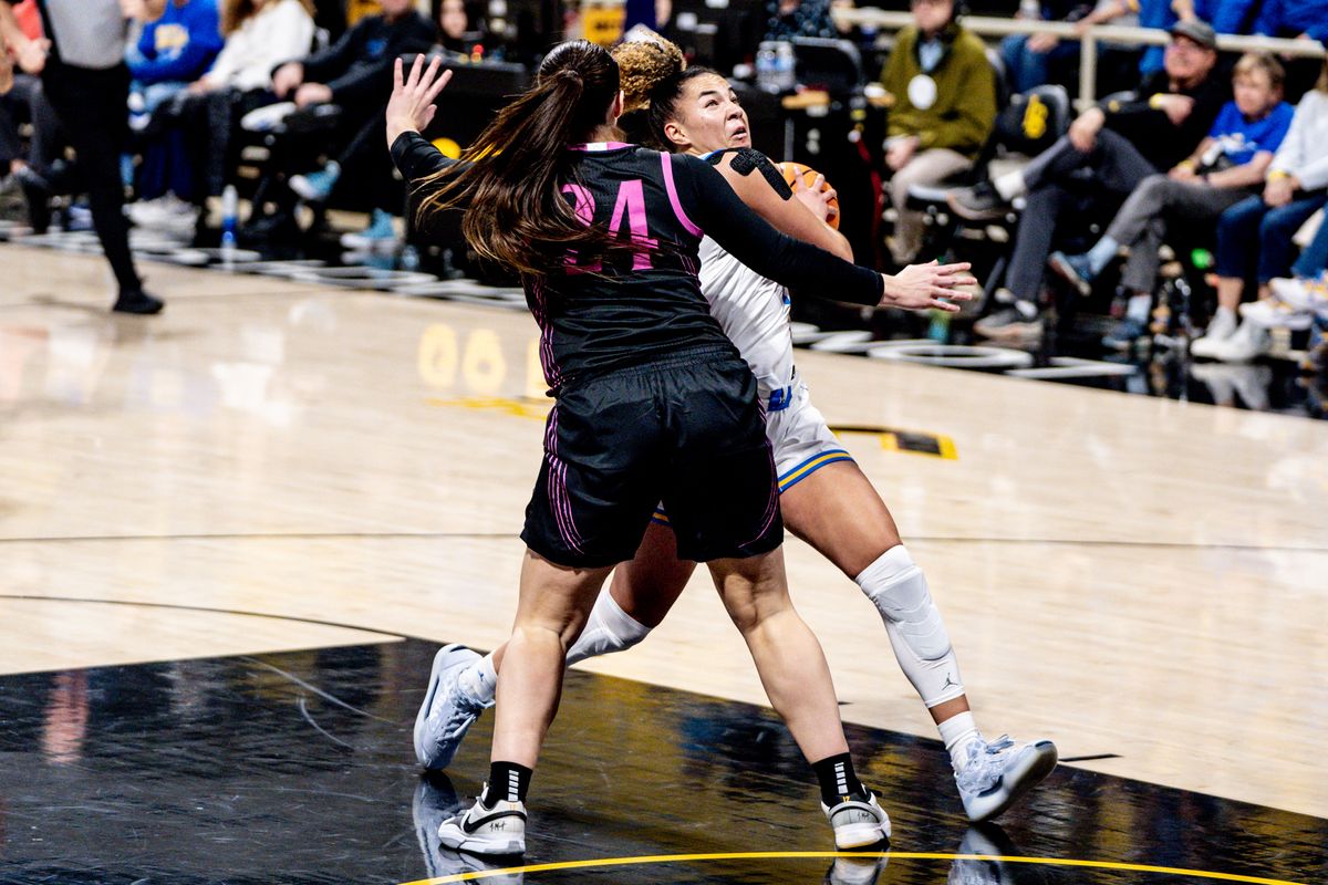 UCLA G KiKi Rice (1) scores two points in a game against Penn State, Wednesday January 15, 2025 in Long Beach, Calif.