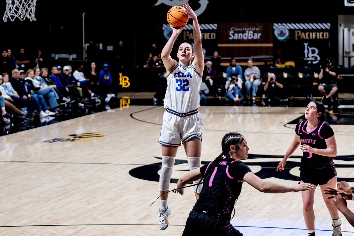 UCLA F Angela Dugalic (32) shoots a pull up jumper over the defender in a game against Penn State, Wednesday January 15, 2025 in Long Beach, Calif.