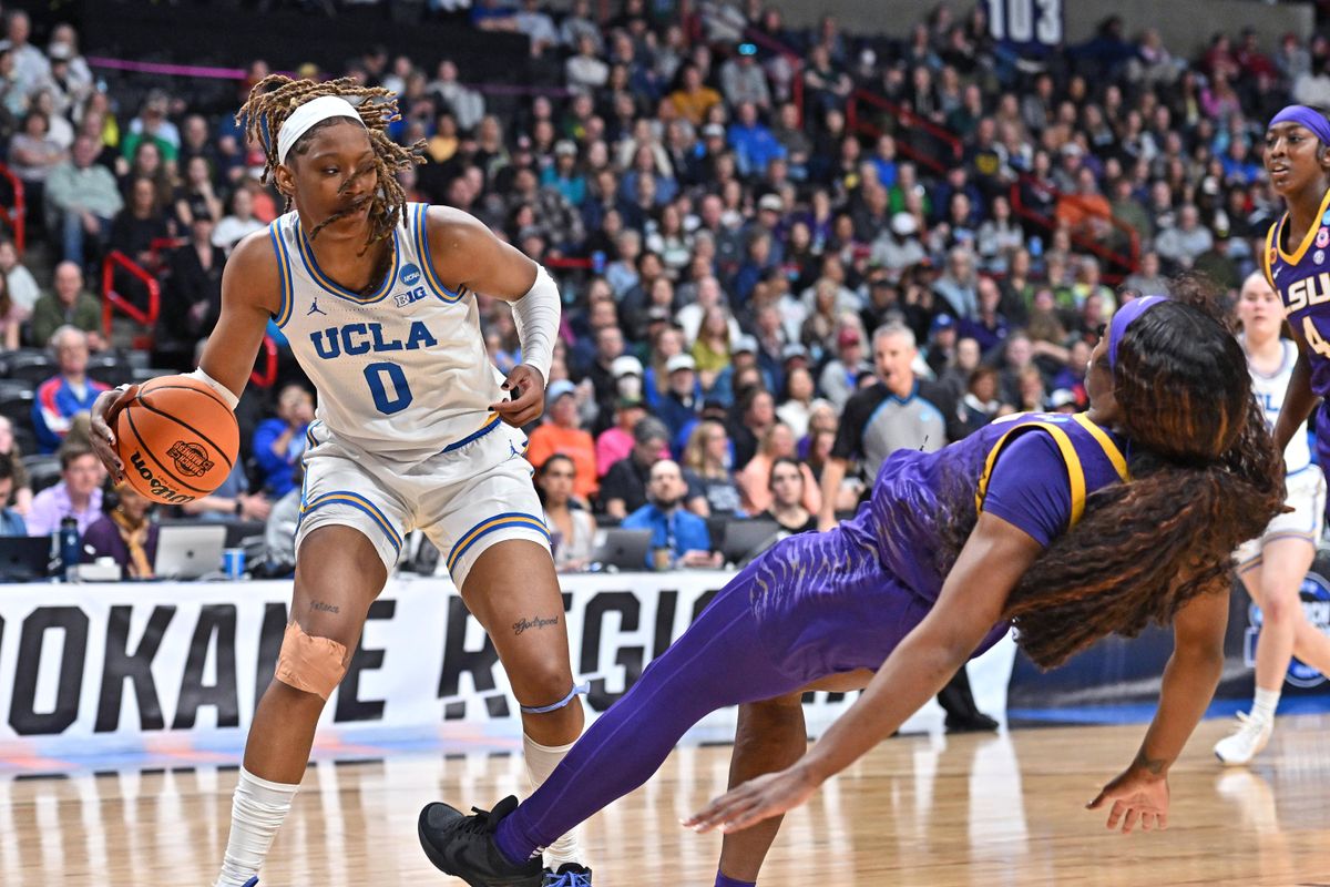 UCLA Bruins forward Janiah Barker (0) runs the baseline against LSU Lady Tigers forward Aneesah Morrow (24) during the first half of a Elite 8 NCAA Tournament basketball game at Spokane Arena. UCLA Bruins forward Janiah Barker (0) runs the baseline against LSU Lady Tigers forward Aneesah Morrow (24) during the first half of a Elite 8 NCAA Tournament basketball game at Spokane Arena.