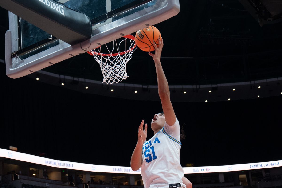 UCLA center Lauren Betts (51) laying the ball up during a Big 10 basketball game against SDSU, Monday, November 3rd, 2025 in Anaheim, California