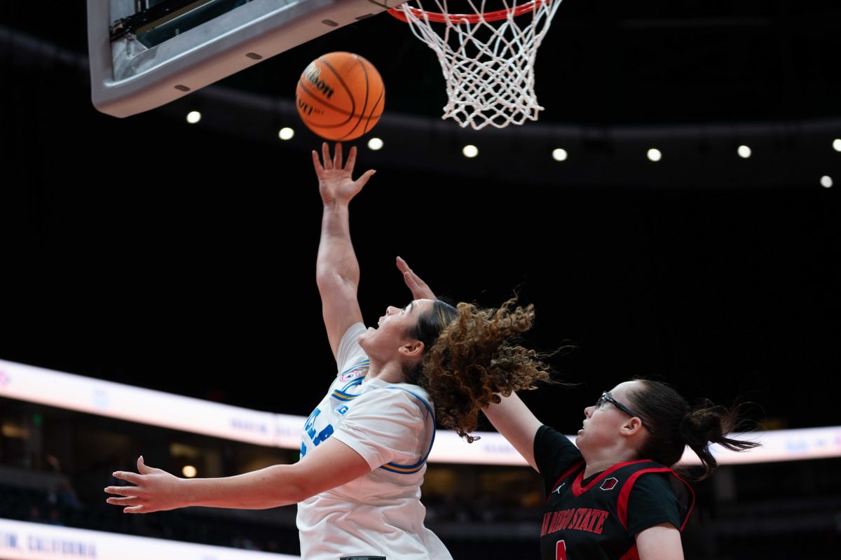 UCLA guard Charlise Lege-Walker (5) taking a reverse lay-up during a Big 10 basketball game against SDSU, Monday, November 3rd, 2025 in Anaheim, California