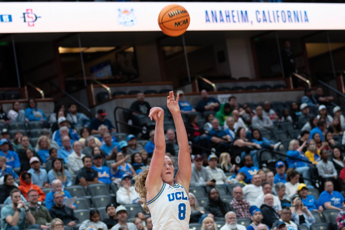 UCLA guard Gianna Knepkens (8) shooting a three-pointer during a Big 10 basketball game against SDSU, Monday, November 3rd, 2025 in Anaheim, California