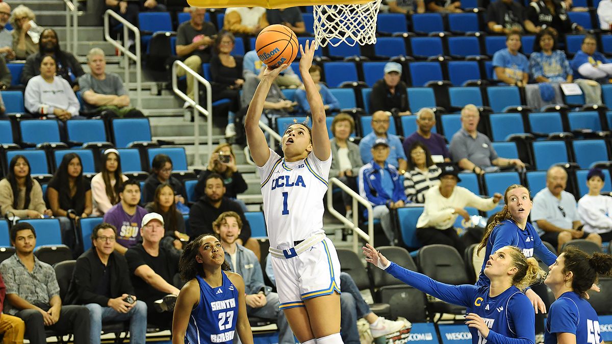 UCLA Bruins guard Kiki Rice (1) lays in a basket during an NCAA basketball game against the UCSB Gauchos on Thursday, November 6, 2025 at Pauley Pavilion in Los Angeles, Calif.  Bruins defeated the Gauchos 87-50.