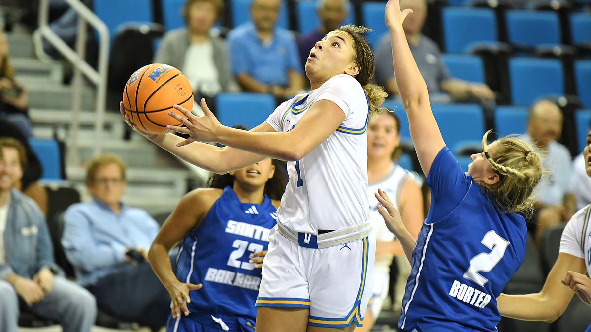 UCLA Bruins guard Kiki Rice (1) lays in a basket during an NCAA basketball game against the UCSB Gauchos on Thursday, November 6, 2025 at Pauley Pavilion in Los Angeles, Calif.  Bruins defeated the Gauchos 87-50.