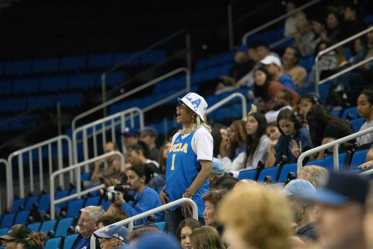 A UCLA fan cheers from the crowd during a NCAA basketball game between UCLA and Southern University on Sunday, November 23, 2025 at Pauley Pavilion in Los Angeles, CA. 