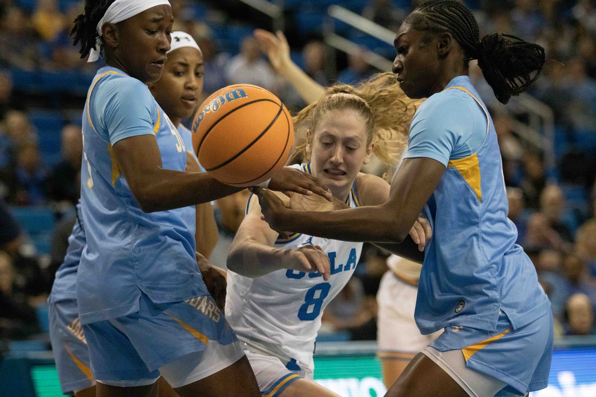 UCLA guard Gianna Kneepkens (8) fights for the ball during a NCAA basketball game between UCLA and Southern University on Sunday, November 23, 2025 at Pauley Pavilion in Los Angeles, CA. 