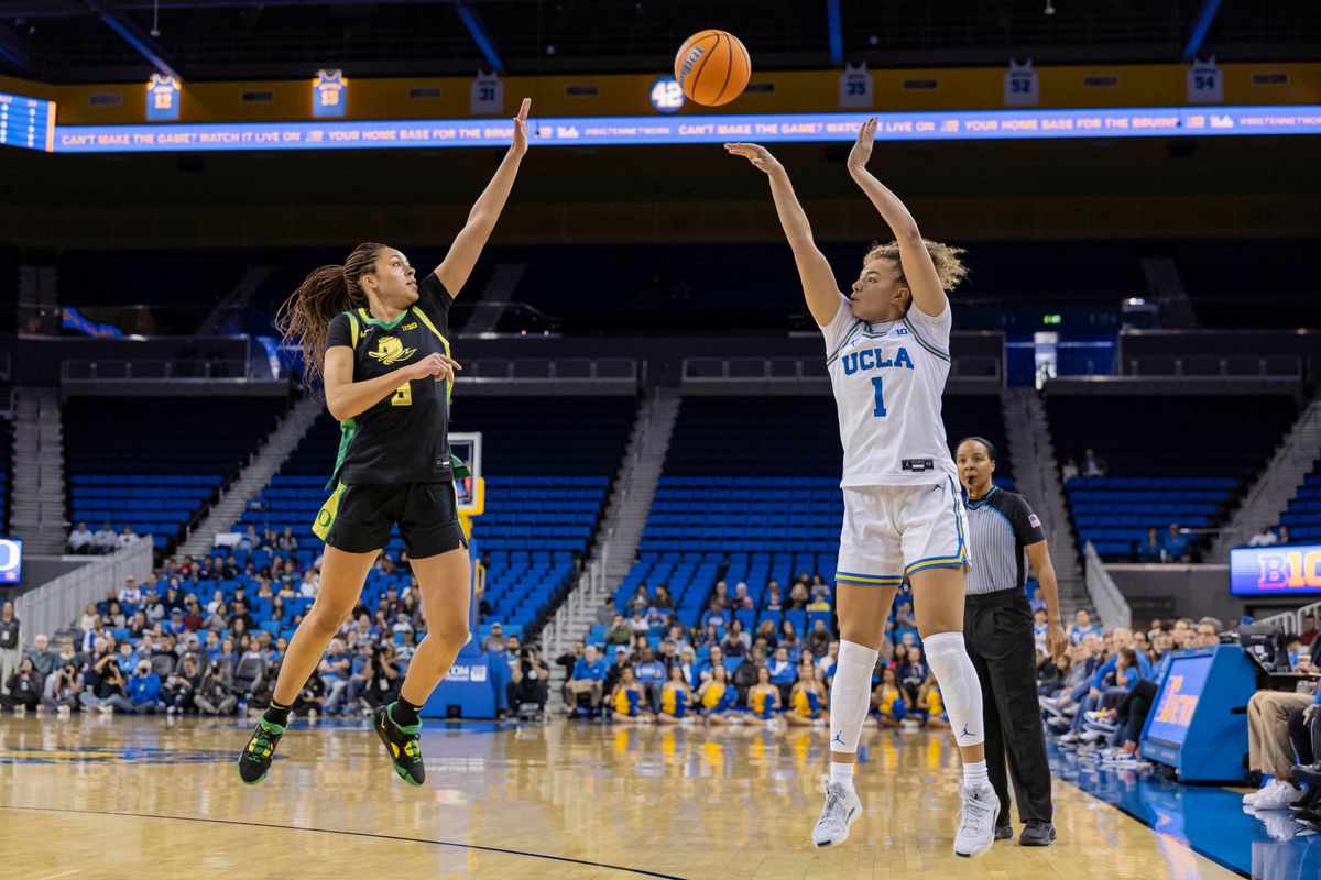 Guard Kiki Rice #1 of the UCLA Bruins shoots a three pointer during an NCAA basketball game against the Oregon Ducks, Sunday December 7, 2025 in Los Angeles, Calif.