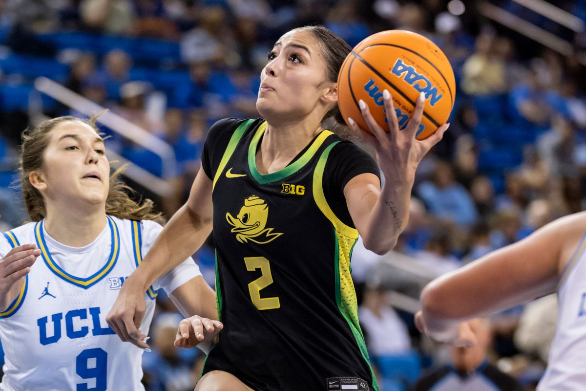 Guard Katie Fiso #2 of the Oregon Ducks drives towards the rim during an NCAA basketball game against the UCLA Bruins, Sunday December 7, 2025 in Los Angeles, Calif.
