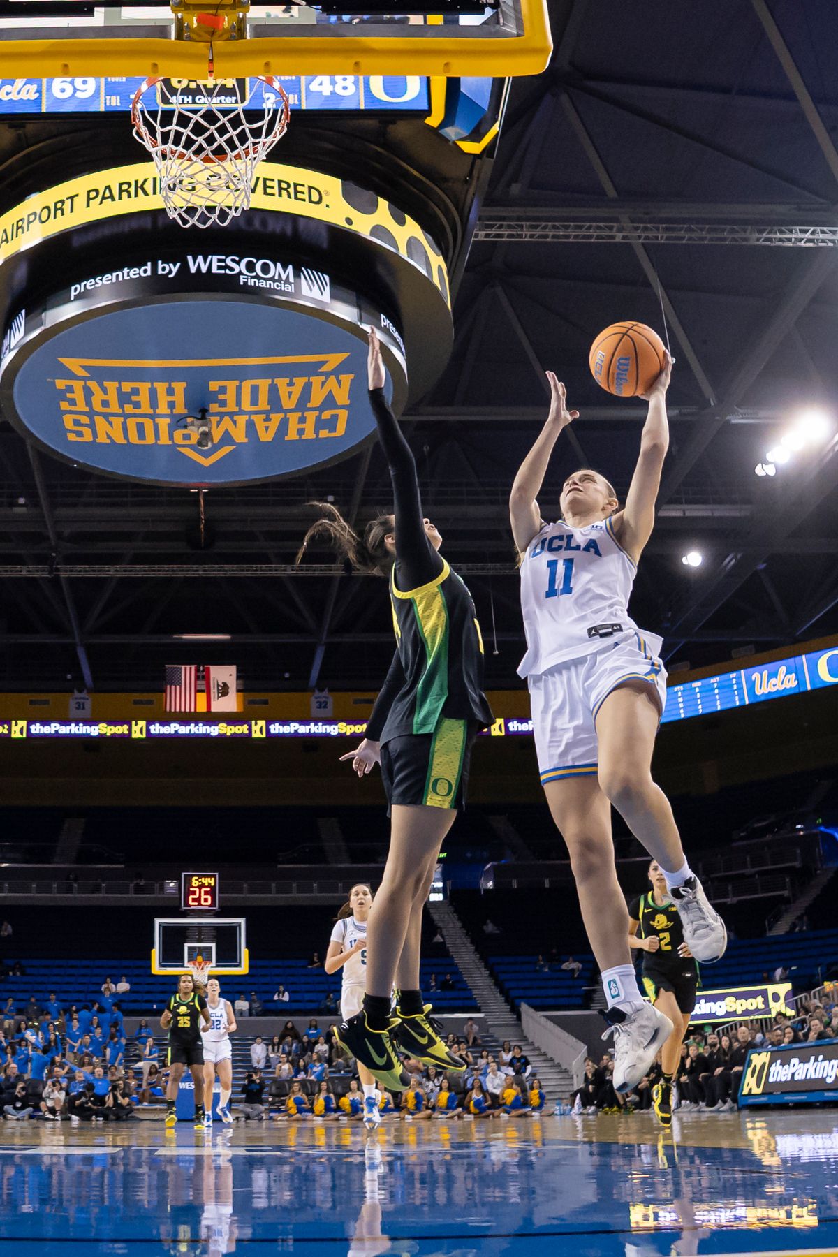 Guard Gabriela Jaquez #11 of the UCLA Bruins lays the ball up during an NCAA basketball game against the Oregon Ducks, Sunday December 7, 2025 in Los Angeles, Calif.