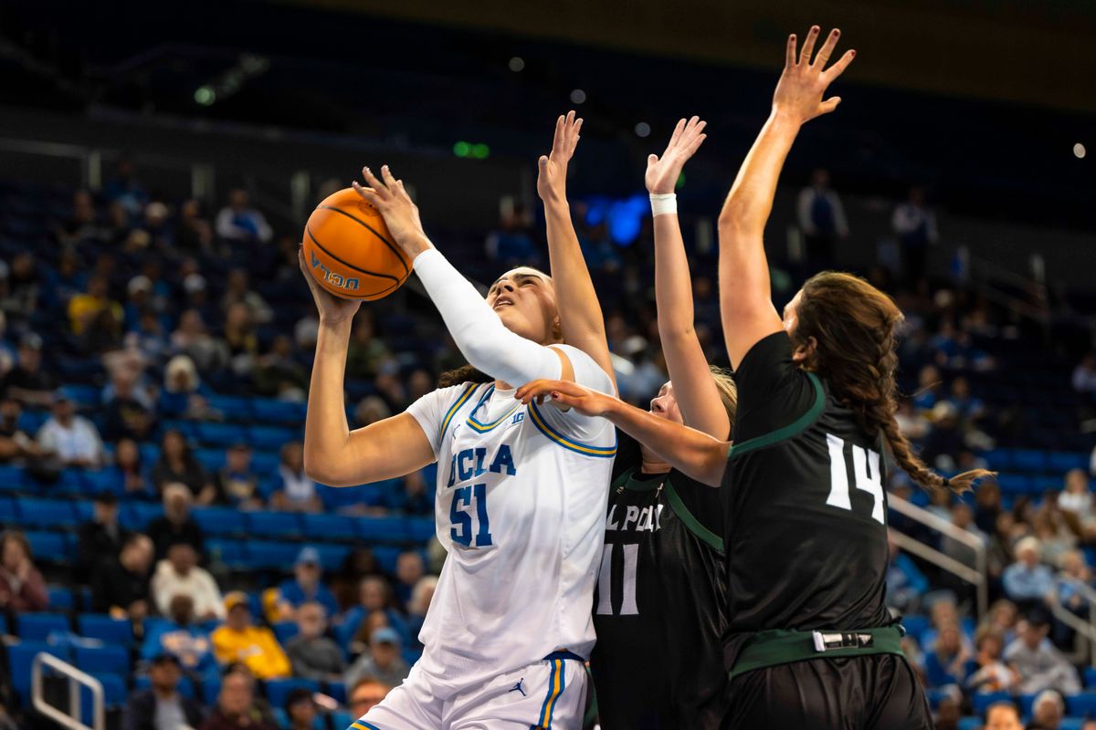 UCLA center, Lauren Betts (51) shooting during a NCAA basketball game against Cal Poly on December 16, 2025 in Los Angeles, CA.