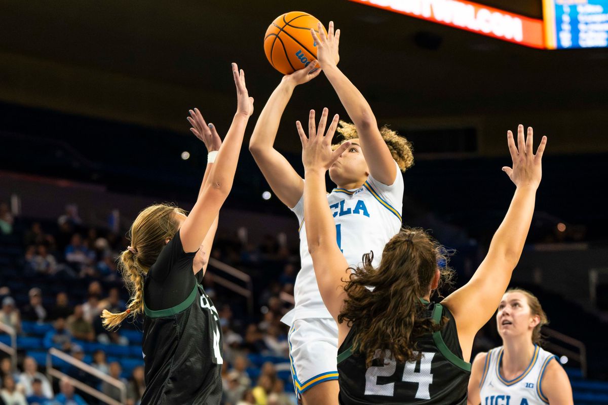 UCLA guard, Kiki Rice (1) shooting during a NCAA basketball game against Cal Poly on December 16, 2025 in Los Angeles, CA.