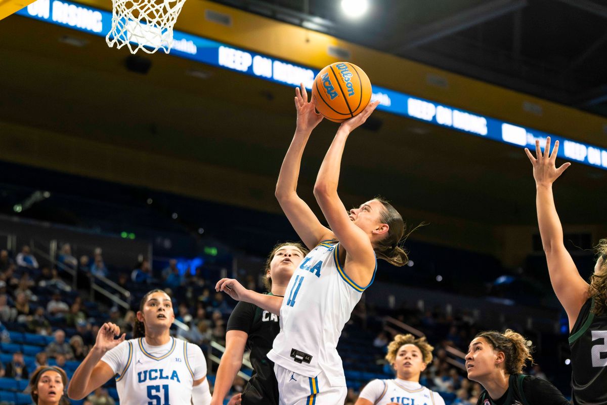 UCLA guard, Gabriela Jaquez (11) shooting after a rebound during a NCAA basketball game against Cal Poly on December 16, 2025 in Los Angeles, CA.
