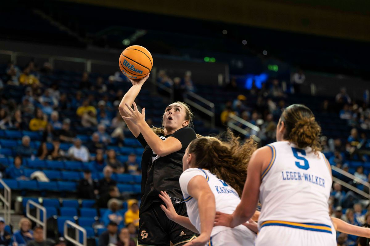 Cal Poly forward, Nora Perez (9) shoots during a NCAA basketball game against UCLA on December 16, 2025 in Los Angeles, CA.