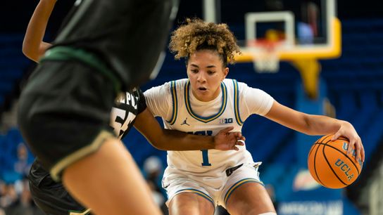 UCLA guard Kiki Rice (1) drives during an NCAA basketball game against Cal Poly on Dec. 16, 2025 in Los Angeles, CA.